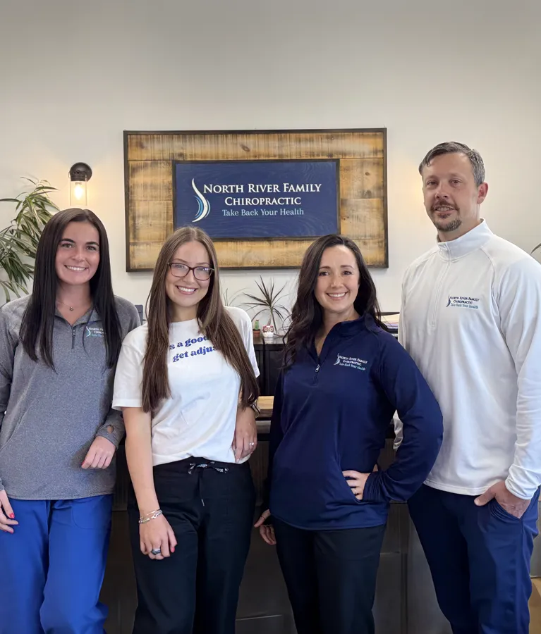 Chiropractor Hingham MA Adam Wadel With Team